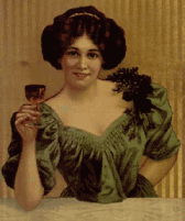 Clarabelle McGrabbe, elbow on table, holding wine glass 